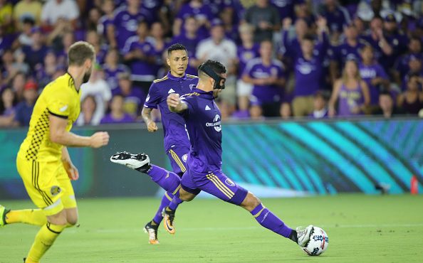 ORLANDO, FL - AUGUST 19:  Dom Dwyer #18 of Orlando City SC attempts a shot on goal during a MLS soc...