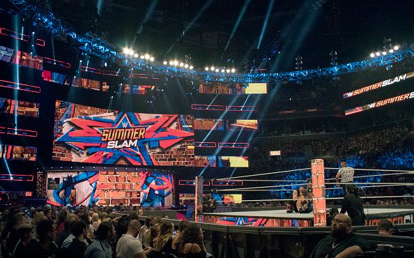 Professional Wrestling: WWE SummerSlam: View of Kevin Owens (top) in action vs AJ Styles during mat...