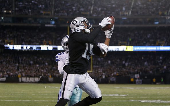 OAKLAND, CA - DECEMBER 17: Michael Crabtree #15 of the Oakland Raiders catches a touchdown against ...