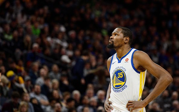 MINNEAPOLIS, MN - MARCH 11: Kevin Durant #35 of the Golden State Warriors looks on during the game ...