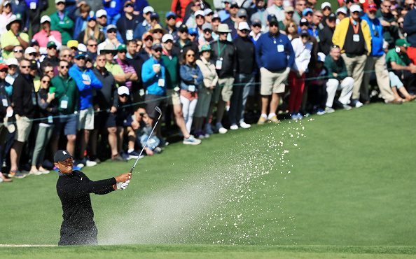 AUGUSTA, GA - APRIL 05:  Tiger Woods of the United States plays his third shot from a bunker on the...