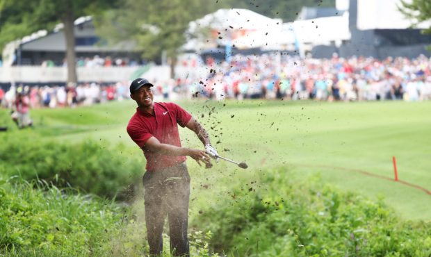 ST LOUIS, MO - AUGUST 12:  Tiger Woods of the United States plays a shot on the 17th hole during th...