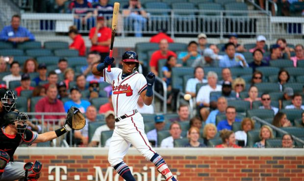 ATLANTA, GA - AUGUST 15: Ronald Acuna Jr. #13 of the Atlanta Braves is hit by the first pitch of th...