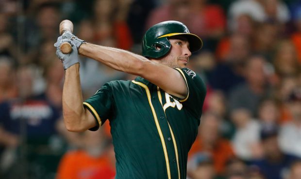 HOUSTON, TX - AUGUST 28:  Matt Olson #28 of the Oakland Athletics hits a three-run home run in the ...