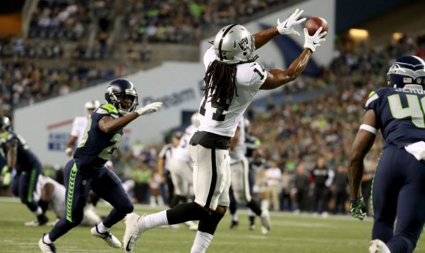 SEATTLE, WA - AUGUST 30:  Keon Hatcher #14 of the Oakland Raiders completes what would be a 19 yard...