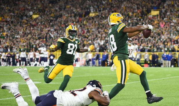 GREEN BAY, WI - SEPTEMBER 09: Randall Cobb #18 of the Green Bay Packers runs in for a touchdown pas...