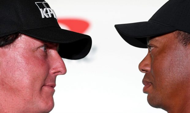 LAS VEGAS, NV - NOVEMBER 20: (L-R) Phil Mickelson and Tiger Woods face-off during a press conferenc...