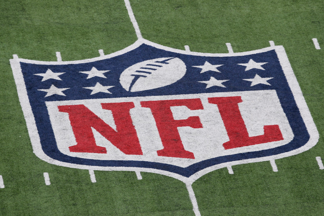 A detail of the official National Football League NFL logo is seen painted on the turf as the New York Giants host the Atlanta Falcons during their NFC Wild Card Playoff game at MetLife Stadium on January 8, 2012 in East Rutherford, New Jersey.