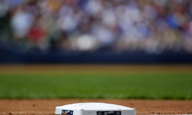 MILWAUKEE, WI - AUGUST 4: The Milwaukee Brewers logo adorns third base during a game between the Wa...