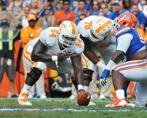 GAINESVILLE, FL - SEPTEMBER 21: Center James Stone #64 of the Tennessee Volunteers sets for play against the Florida Gators  September 21, 2013 at Ben Hill Griffin Stadium at Florida Field in Gainesville, Florida.  (Photo by Al Messerschmidt/Getty Images)