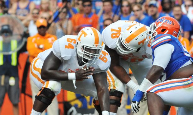 GAINESVILLE, FL - SEPTEMBER 21: Center James Stone #64 of the Tennessee Volunteers sets for play ag...