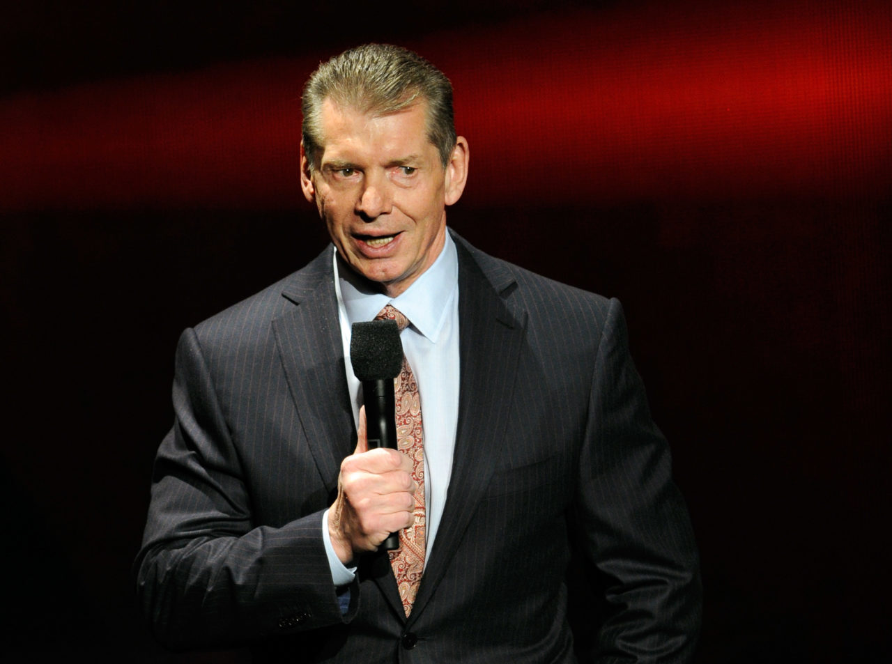 Vince McMahon speaks at a news conference announcing the WWE Network at the 2014 International CES at the Encore Theater at Wynn Las Vegas on January 8, 2014 in Las Vegas, Nevada. The network will launch on February 24, 2014 as the first-ever 24/7 streaming network, offering both scheduled programs and video on demand. The USD 9.99 per month subscription will include access to all 12 live WWE pay-per-view events each year. CES, the world's largest annual consumer technology trade show, runs through January 10 and is expected to feature 3,200 exhibitors showing off their latest products and services to about 150,000 attendees.