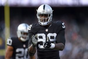 OAKLAND, CA - NOVEMBER 15: Outside linebacker Aldon Smith #99 of the Oakland Raiders celebrates in the third quarter against the Minnesota Vikings at O.co Coliseum on November 15, 2015 in Oakland, California. (Photo by Thearon W. Henderson/Getty Images)