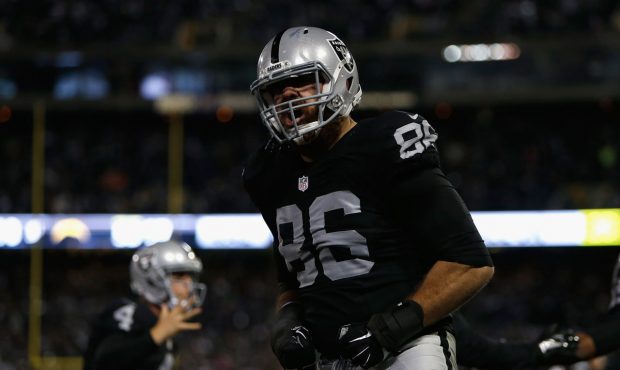 OAKLAND, CA - DECEMBER 24: Tight end Lee Smith #86 of the Oakland Raiders celebrates a touchdown sc...