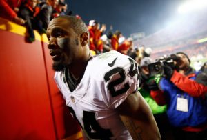 KANSAS CITY, MO - JANUARY 03: Free safety Charles Woodson #24 of the Oakland Raiders walks off the field following the Raiders 23-17 loss to the Kansas City Chiefs in the game at Arrowhead Stadium on January 3, 2016 in Kansas City, Missouri. (Photo by Jamie Squire/Getty Images)