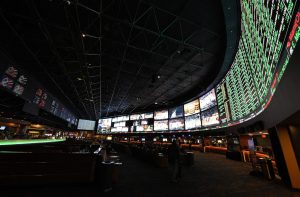 LAS VEGAS, NV - FEBRUARY 02: The betting line and some of the nearly 400 proposition bets for Super Bowl 50 between the Carolina Panthers and the Denver Broncos are displayed at the Race & Sports SuperBook at the Westgate Las Vegas Resort & Casino on February 2, 2016 in Las Vegas, Nevada. The newly renovated sports book has the world's largest indoor LED video wall with 4,488 square feet of HD video screens measuring 240 feet wide and 20 feet tall.