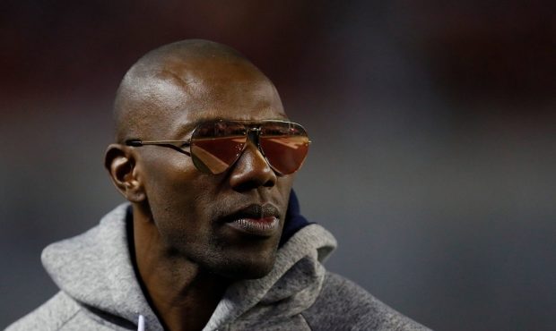 TUSCALOOSA, AL - NOVEMBER 19: Former Chattanooga and NFL player Terrell Owens looks on from the sid...