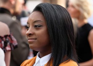 HOLLYWOOD, CA - DECEMBER 07: Olympic gymnast Simone Biles attends The Hollywood Reporter's Annual Women in Entertainment Breakfast in Los Angeles at Milk Studios on December 7, 2016 in Hollywood, California. (Photo by Frazer Harrison/Getty Images for The Hollywood Reporter )
