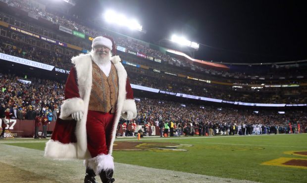 LANDOVER, MD - DECEMBER 19: Santa Claus walks on the sidelines during a game between the Washington...