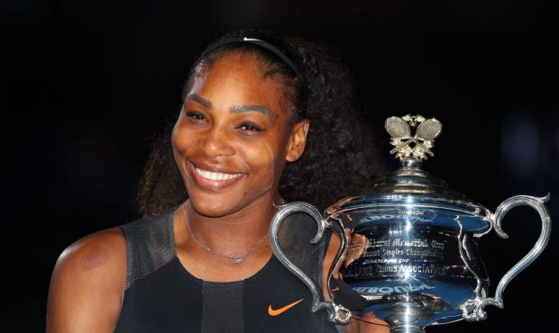 MELBOURNE, AUSTRALIA - JANUARY 28: Serena Williams poses with the Daphne Akhurst Trophy after winni...