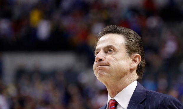 INDIANAPOLIS, IN - MARCH 19: Head coach Rick Pitino of the Louisville Cardinals reacts to their 69-...