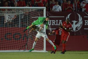 PHOENIX, AZ - JUNE 10: Josh Cohen #18 of Phoenix Rising FC jumps over Cole Seiler #14 of Vancouver Whitecaps II on a free kick in the first half of the match at Phoenix Rising Soccer Complex on June 10, 2017 in Phoenix, Arizona.