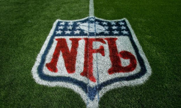 DENVER - SEPTEMBER 16: The logo of the National Football League is painted on the field as the Oakl...
