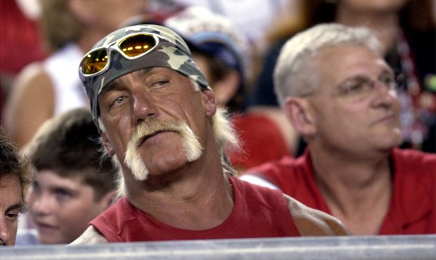 Hulk Hogan follows the play from a front-row seat during the second quarter August 23, 2003 at Raym...