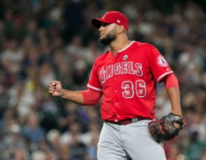 SEATTLE, WA - AUGUST 11: Yusmeiro Petit #36 of the Los Angeles Angels of Anaheim celebrates closing out the game to beat the Seattle Mariners 6-5 in the ninth inning at Safeco Field on August 11, 2017 in Seattle, Washington. (Photo by Lindsey Wasson/Getty Images)