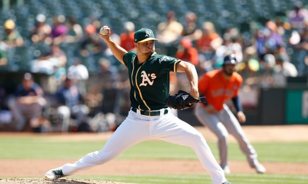 OAKLAND, CA - SEPTEMBER 10: Kendall Graveman #49 of the Oakland Athletics pitches in the second inn...