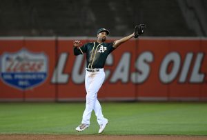 OAKLAND, CA - SEPTEMBER 22: Marcus Semien #10 of the Oakland Athletics catches a line drive off the bat of Adrian Beltre #29 of the Texas Rangers in the top of the eighth inning at Oakland Alameda Coliseum on September 22, 2017 in Oakland, California. (Photo by Thearon W. Henderson/Getty Images)