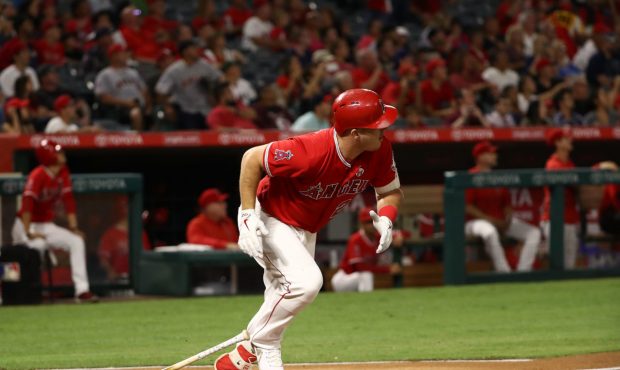 ANAHEIM, CA - SEPTEMBER 29: Mike Trout #27 of the Los Angeles Angels of Anaheim drops his bat as he...