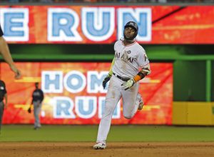 MIAMI, FL - OCTOBER 1: Marcell Ozuna #13 of the Miami Marlins runs the bases after hitting a seventh-inning solo home run against the Atlanta Braves at Marlins Park on October 1, 2017 in Miami, Florida. (Photo by Joe Skipper/Getty Images)