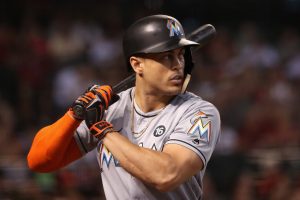 PHOENIX, AZ - SEPTEMBER 24: Giancarlo Stanton #27 of the Miami Marlins warms up on deck during the MLB game against the Arizona Diamondbacks at Chase Field on September 24, 2017 in Phoenix, Arizona. (Photo by Christian Petersen/Getty Images)