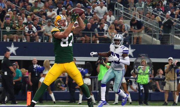 ARLINGTON, TX - OCTOBER 08: Jordy Nelson #87 of the Green Bay Packers goes up for a touchdown pass ...