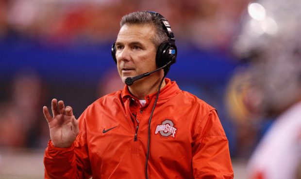INDIANAPOLIS, IN - DECEMBER 02: Head coach Urban Meyer of the Ohio State Buckeyes looks on as they ...