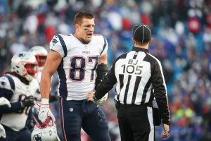 ORCHARD PARK, NY - DECEMBER 3: Rob Gronkowski #87 of the New England Patriots talks with back judge Dino Paganelli #105 during the fourth quarter against the Buffalo Bills on December 3, 2017 at New Era Field in Orchard Park, New York.
