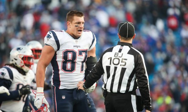 ORCHARD PARK, NY - DECEMBER 3: Rob Gronkowski #87 of the New England Patriots talks with back judge...