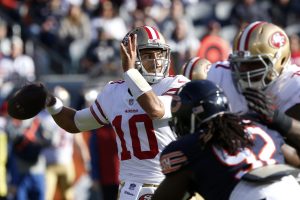 CHICAGO, IL - DECEMBER 03: Quarterback Jimmy Garoppolo #10 of the San Francisco 49ers looks to pass the football in the first quarter against the Chicago Bears at Soldier Field on December 3, 2017 in Chicago, Illinois. The San Francisco 49ers defeated the Chicago Bears 15-14.