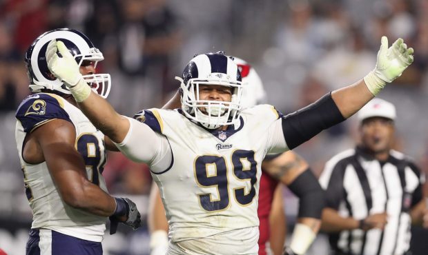 GLENDALE, AZ - DECEMBER 03: Defensive end Aaron Donald #99 of the Los Angeles Rams reacts after a t...