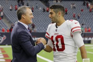 HOUSTON, TX - DECEMBER 10: Jimmy Garoppolo #10 of the San Francisco 49ers celebrates with general manager John Lynch after the game against the Houston Texans at NRG Stadium on December 10, 2017 in Houston, Texas.