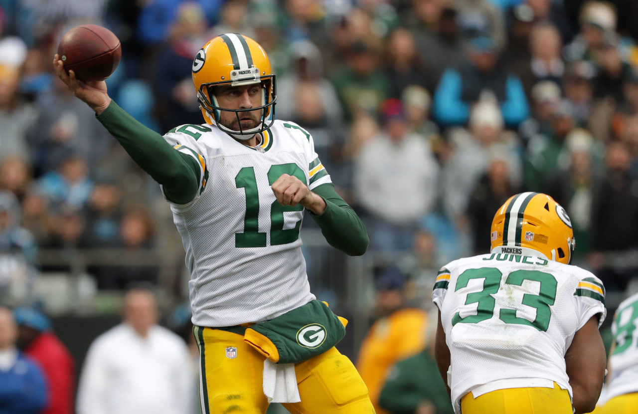 CHARLOTTE, NC - DECEMBER 17: Aaron Rodgers #12 of the Green Bay Packers throws a pass against the Carolina Panthers in the fourth quarter during their game at Bank of America Stadium on December 17, 2017 in Charlotte, North Carolina. (Photo by Streeter Lecka/Getty Images)