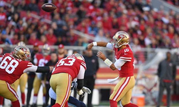 SANTA CLARA, CA - DECEMBER 17: Jimmy Garoppolo #10 of the San Francisco 49ers throws a pass against...