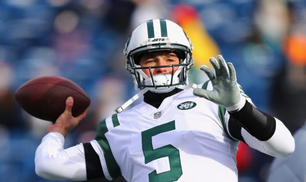 FOXBORO, MA - DECEMBER 31: Christian Hackenberg #5 of the New York Jets warms up before the game ag...