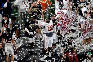 ATLANTA, GA - JANUARY 08:  Jamar King #90 of the Alabama Crimson Tide celebrates beating the Georgia Bulldogs in overtime to win the CFP National Championship presented by AT&T at Mercedes-Benz Stadium on January 8, 2018 in Atlanta, Georgia. Alabama won 26-23.  (Photo by Mike Zarrilli/Getty Images)