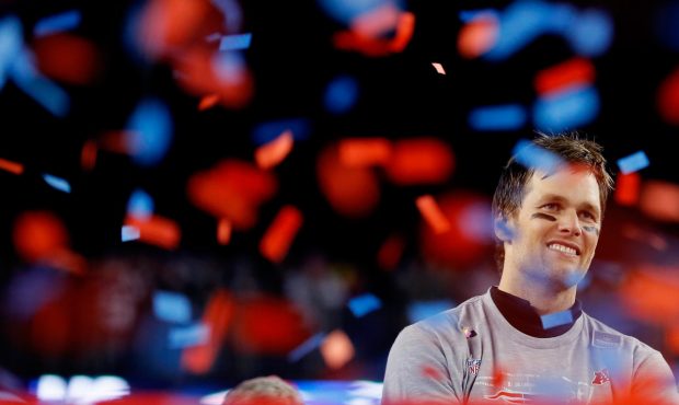 FOXBOROUGH, MA - JANUARY 21:  Tom Brady #12 of the New England Patriots celebrates after winning th...