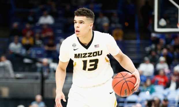 ST LOUIS, MO - MARCH 08: Michael Porter Jr #13 of the Missouri Tigers dribbles the ball against the...