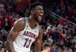 LAS VEGAS, NV - MARCH 10: Deandre Ayton #13 of the Arizona Wildcats reacts after dunking against the USC Trojans during the championship game of the Pac-12 basketball tournament at T-Mobile Arena on March 10, 2018 in Las Vegas, Nevada. The Wildcats won 75-61. (Photo by Ethan Miller/Getty Images)