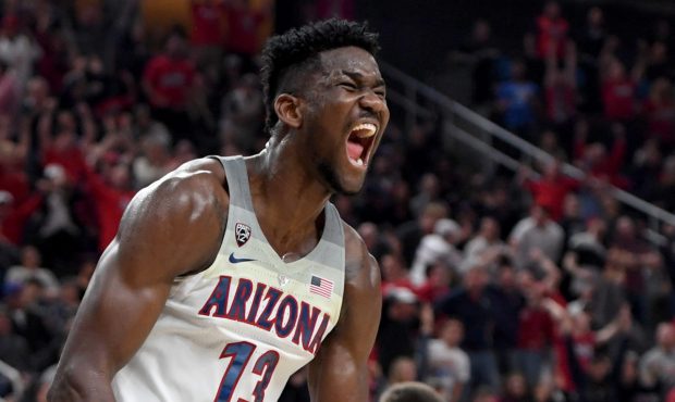 LAS VEGAS, NV - MARCH 10: Deandre Ayton #13 of the Arizona Wildcats reacts after dunking against th...