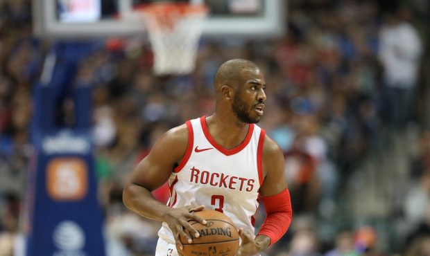 DALLAS, TX - MARCH 11: Chris Paul #3 of the Houston Rockets at American Airlines Center on March 11...